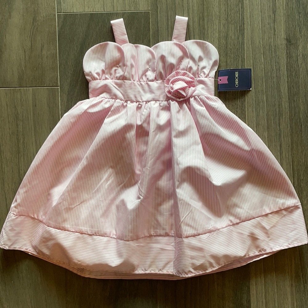 Brand new. Girls Cherokee Dress. Size 24 Months